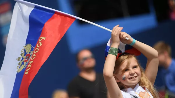 Болельщица сборной России перед матчем чемпионата мира по футболу между сборными Уругвая и России, 2018 год - Sputnik Таджикистан